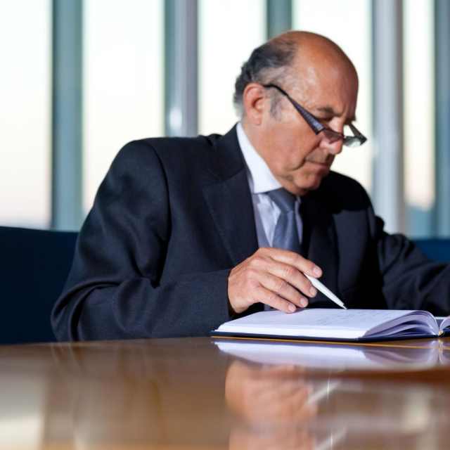 Accountant Reviewing Plans
